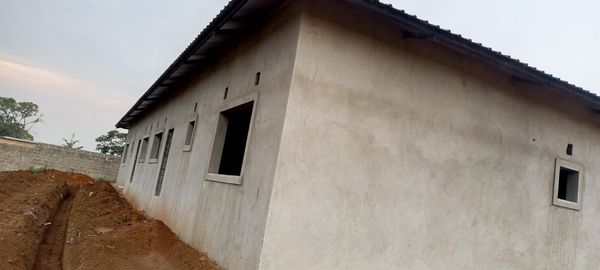 Side elevation showing roofing and external plastering
